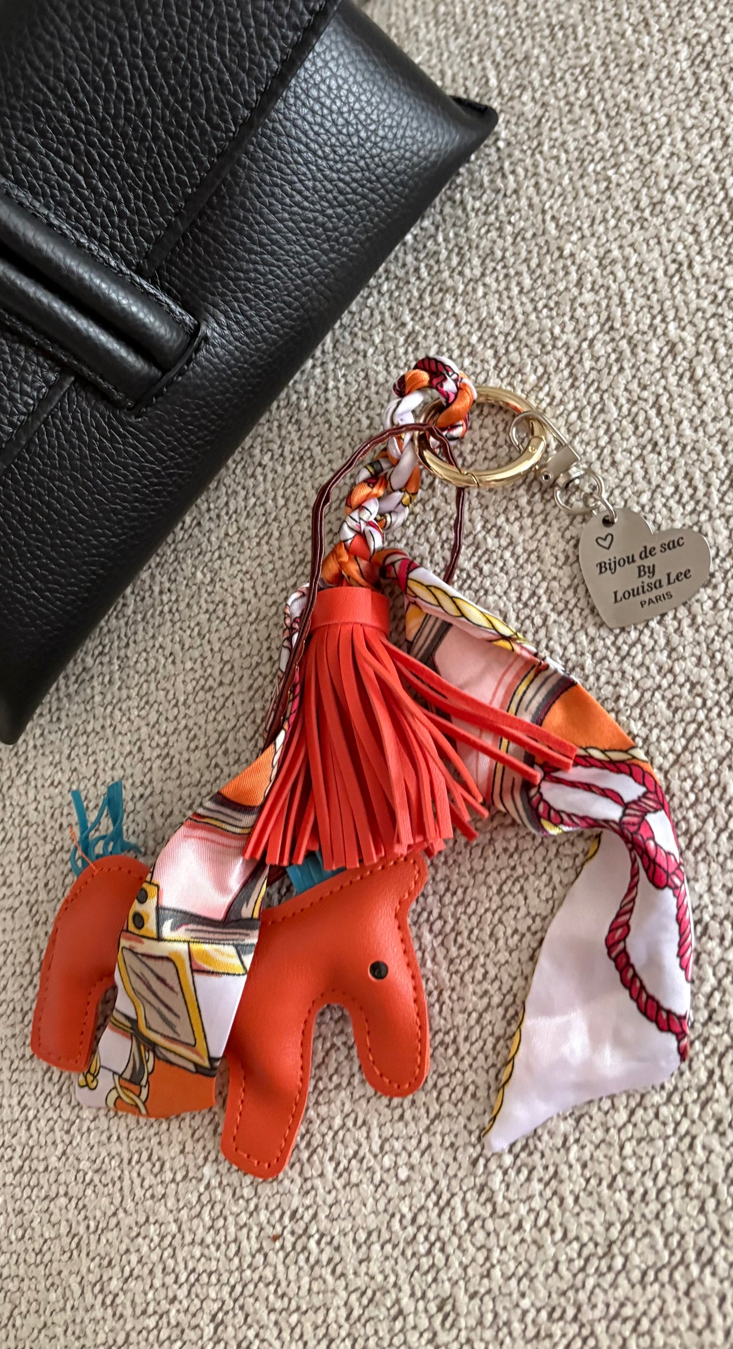 Bijou de sac Signature Cuir